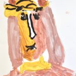 Abstract Picasso-style portrait painting (head and top of chest) on white background. Face is painted two colors split in half vertically: yellow and light brown. Facial features created using black paint. Head has long, straight light-brown hair with a yellow hat. Neck is yellow and top of chest is light brown.