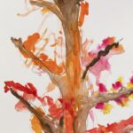 Light-brown painted tree trunk in center, vertical from top to bottom of a white piece of paper. Red, orange, yellow and pink paint strokes on the branches.