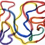Abstract curvy line drawing with black-sharpie on white background. Rainbow-colored watercolor painted on-top of the sharpie lines (Alternating: red, orange, yellow, green, blue, and purple)