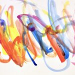 Abstract watercolor painting with purple, pink, blue, orange, red and yellow brush strokes on a white background.