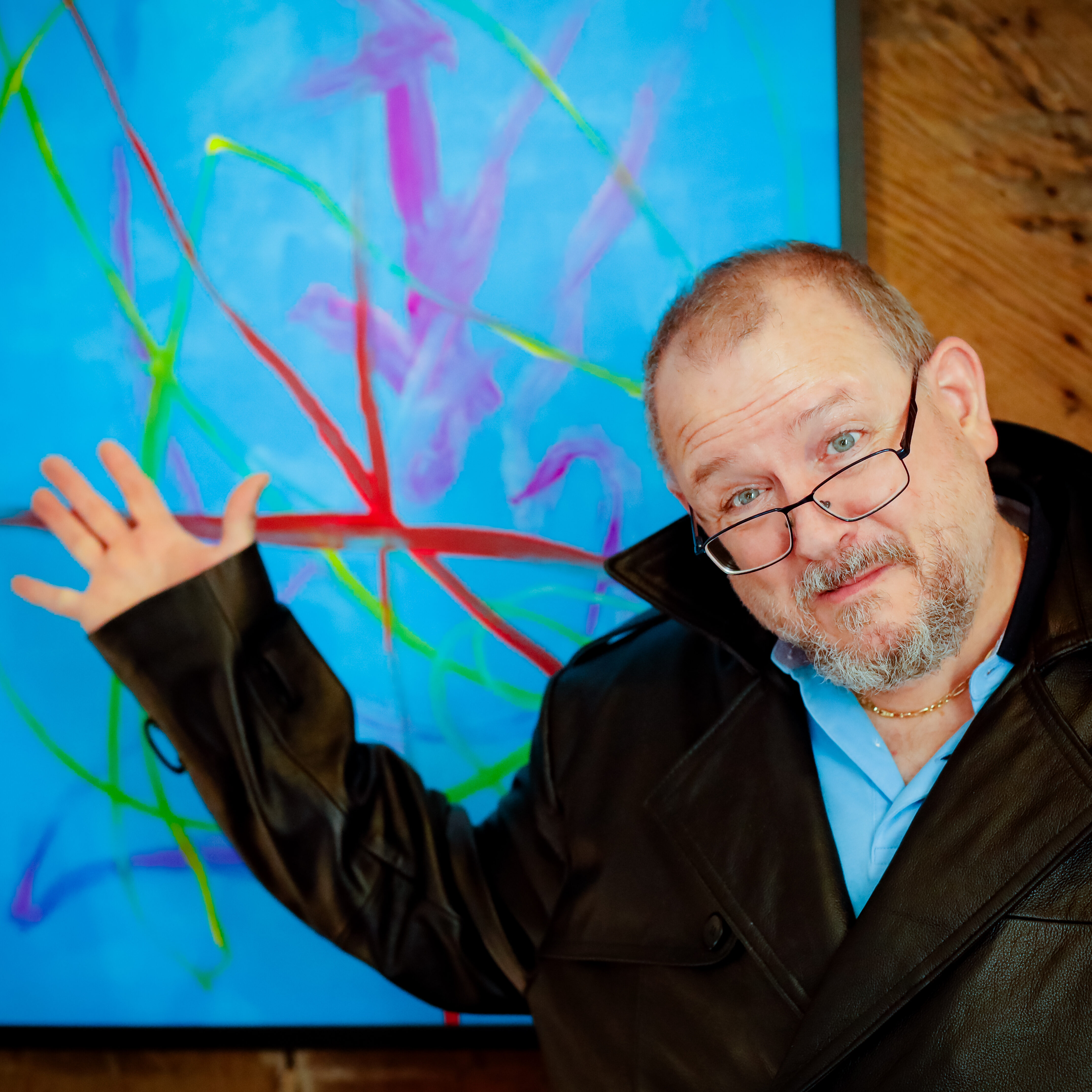 Photo: John Chapdelaine (BCArc Nu-Opps Brain Injury Program) with his painting “Jellyfish”