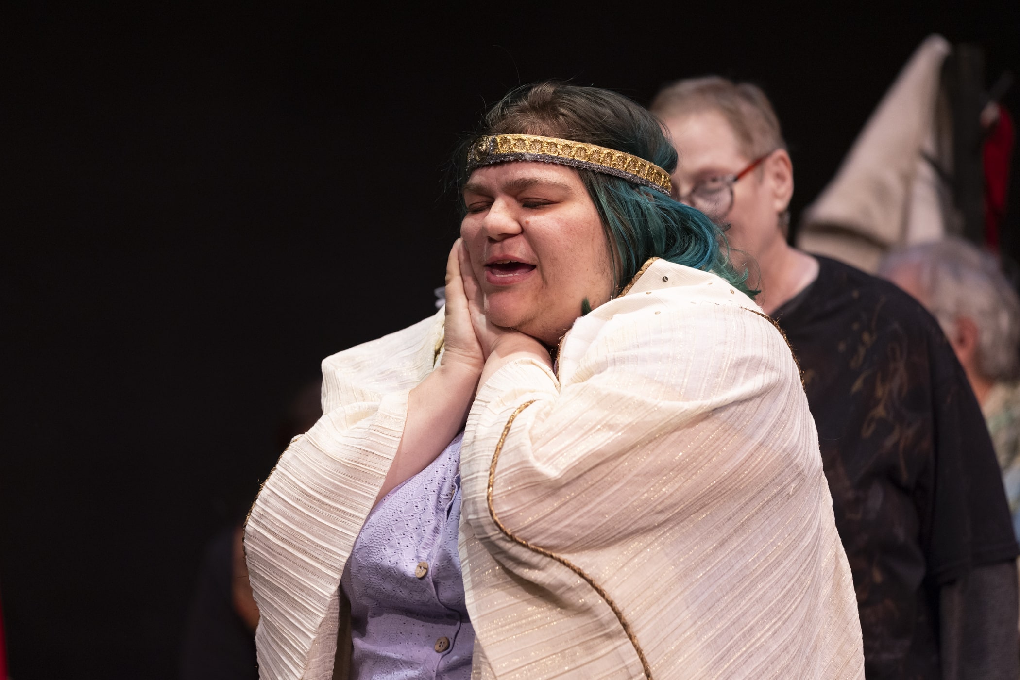 Sam's Cleopatra rests her head on her hands.