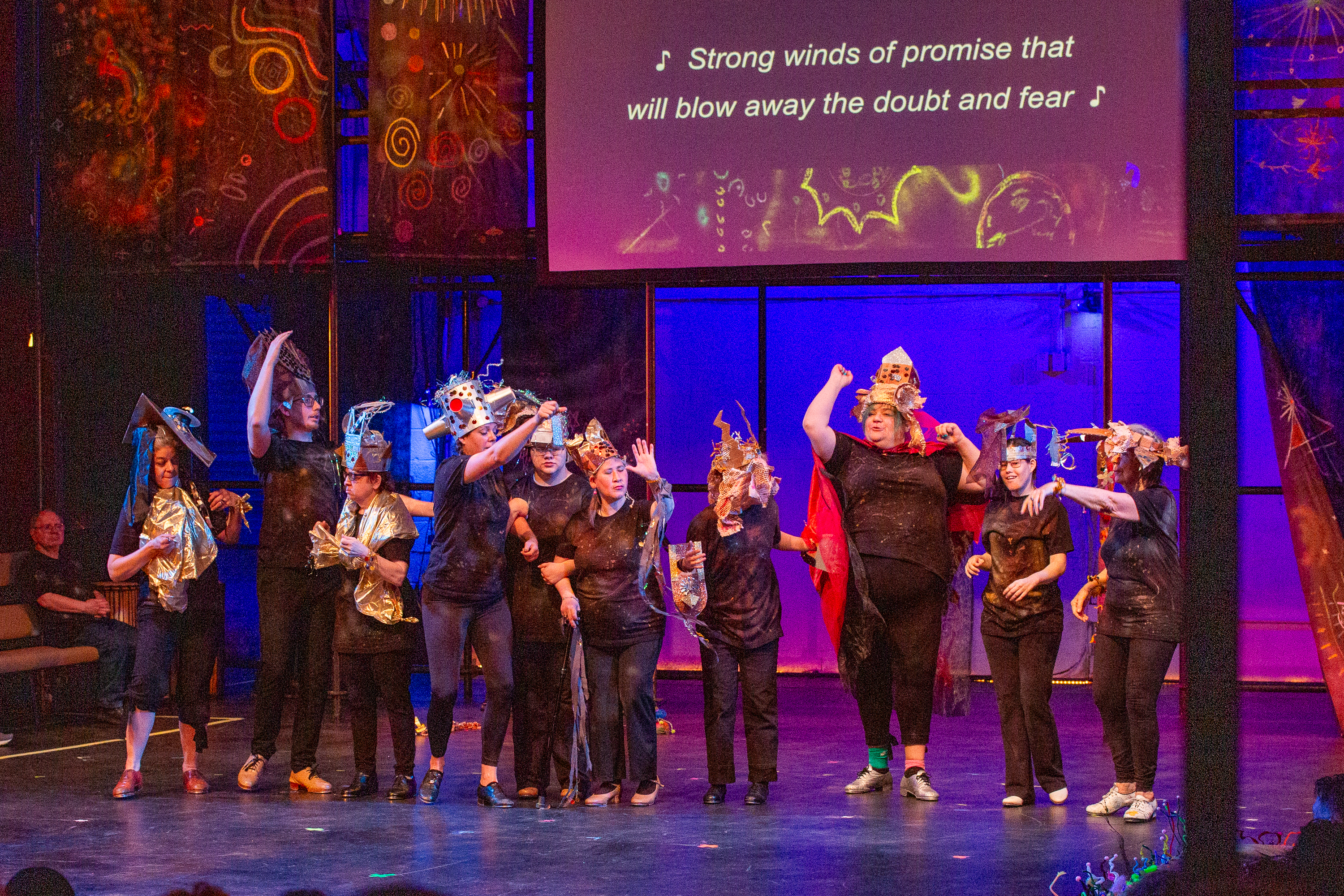 Live open captioning runs throughout the show!