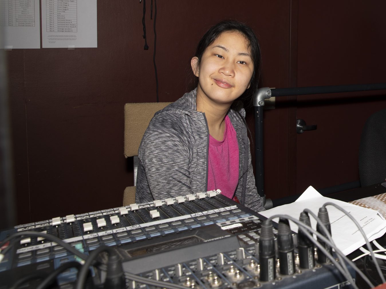 Faye designed the lighting cues for CATA’s performance. “I’m excited to be in the booth. It’s magical making different patterns with lights.”