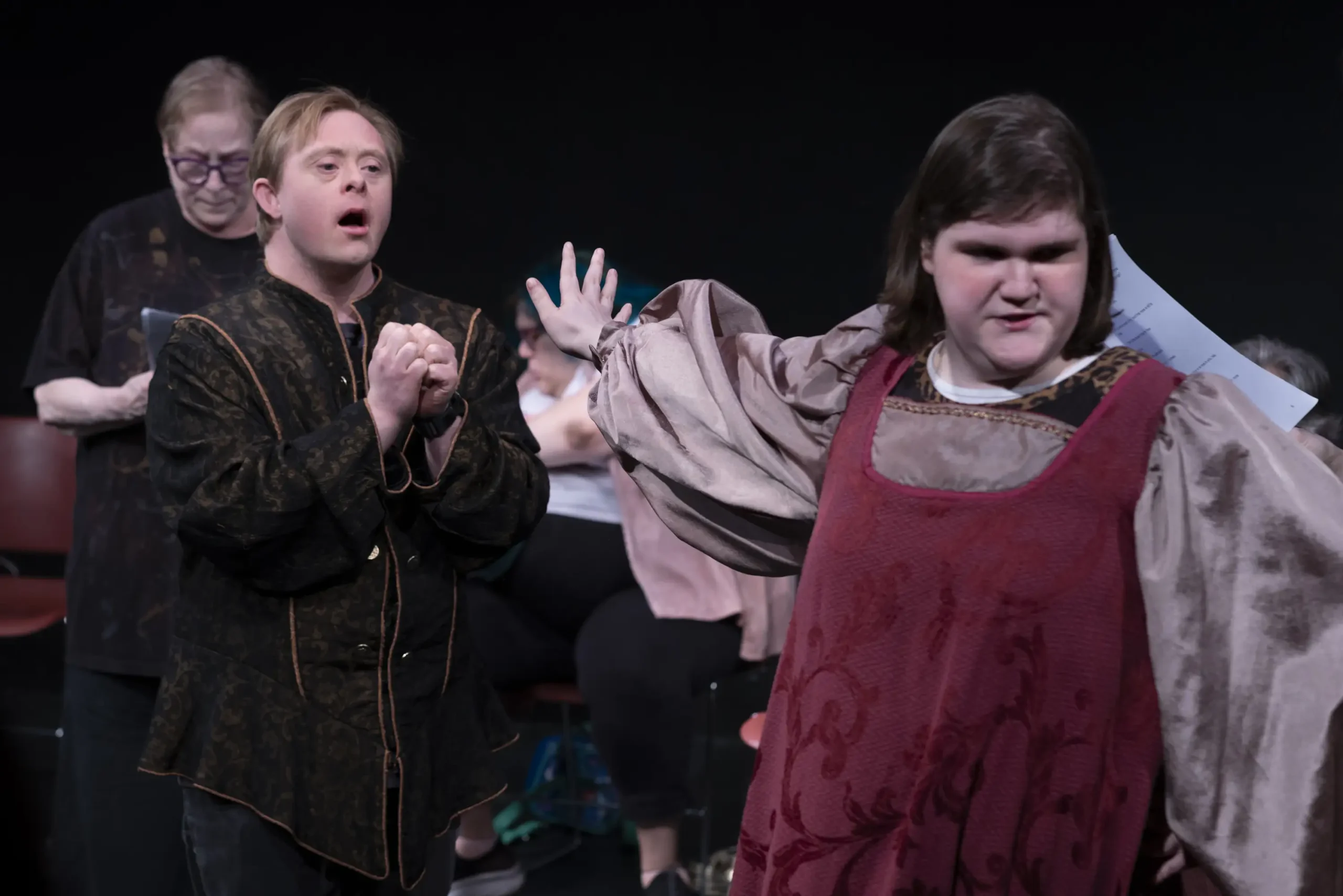 Dan's Benedict pleads with Kiera's Beatrice in "Much Ado About Nothing."