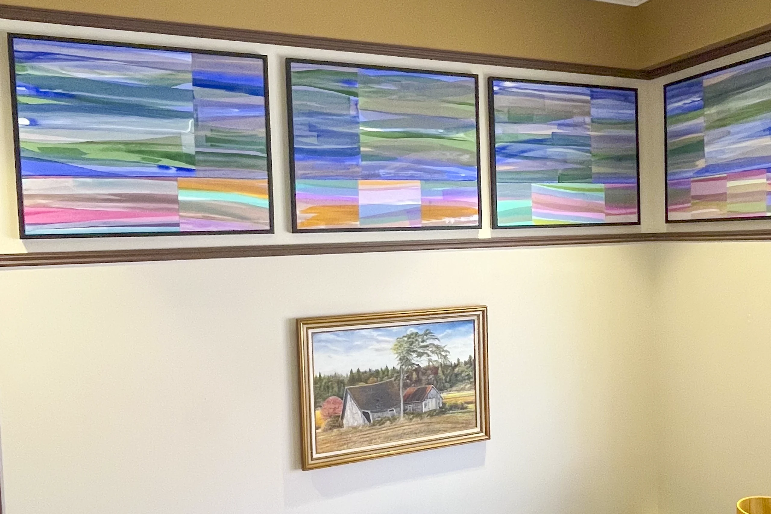 CATA's mural "Gentle Horizon, Comforting Light" in the lobby of the Elizabeth Freeman Center(right).