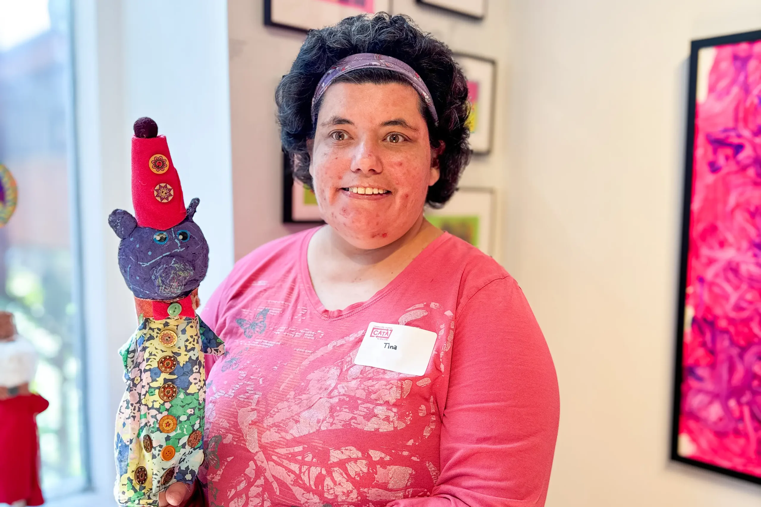 Tina (BCArc / Blue Q) proudly exhibits her sculpture at the Lichtenstein Center for the Arts.